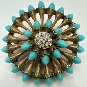 Vintage gold tone clear rhinestones faux turquoise lucite starburst brooch